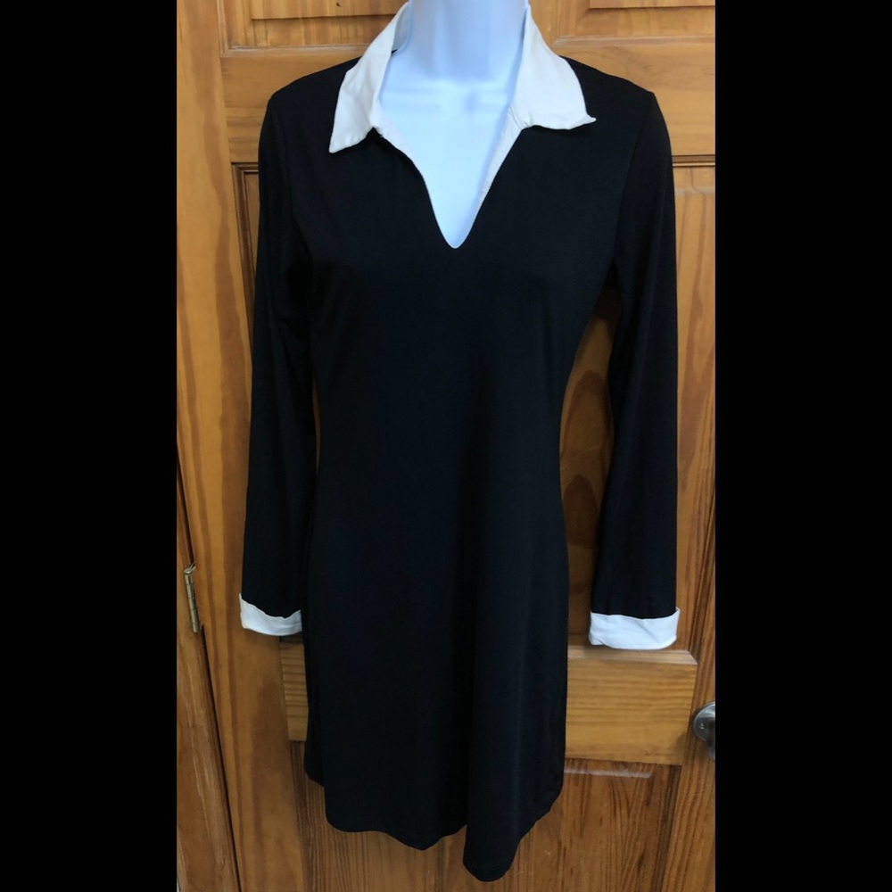 Black dress with white collar and cuffs. Halloween nun costume business suit
